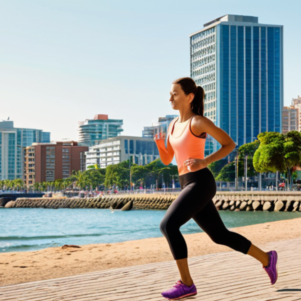 **Image Prompt:** A vibrant coastal city scene with people actively engaged in healthy activities like jogging on the beach, practicing yoga in a park, and cycling along the waterfront. In the background, modern buildings blend with the natural beauty, symbolizing a focus on personal well-being amidst urban life. A smart watch is subtly visible on someone's wrist.